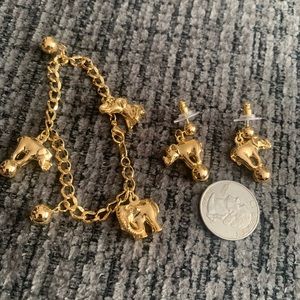 Avon elephant charm bracelet and earrings